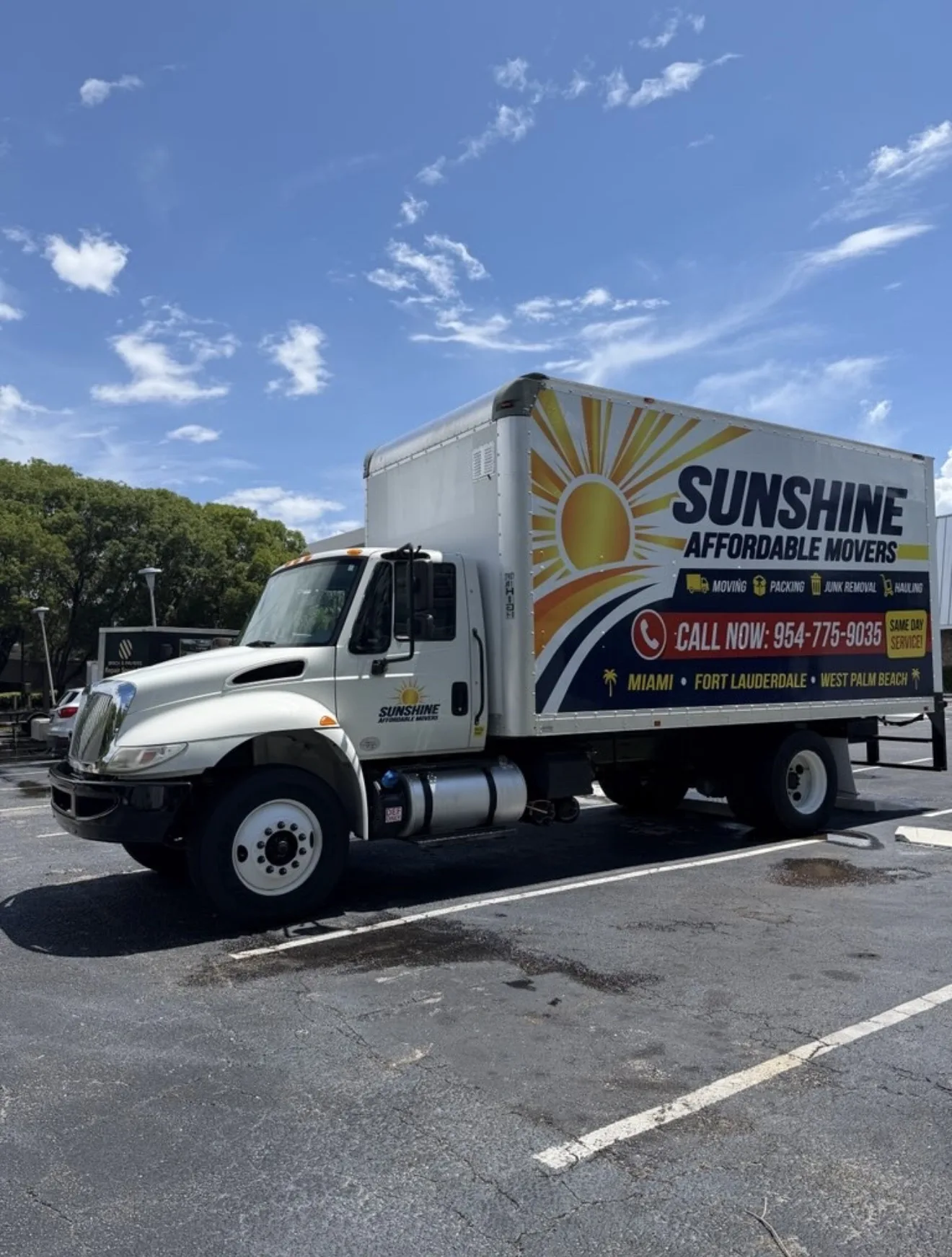 Sunshine Affordable Movers large box truck ready for a commercial move.